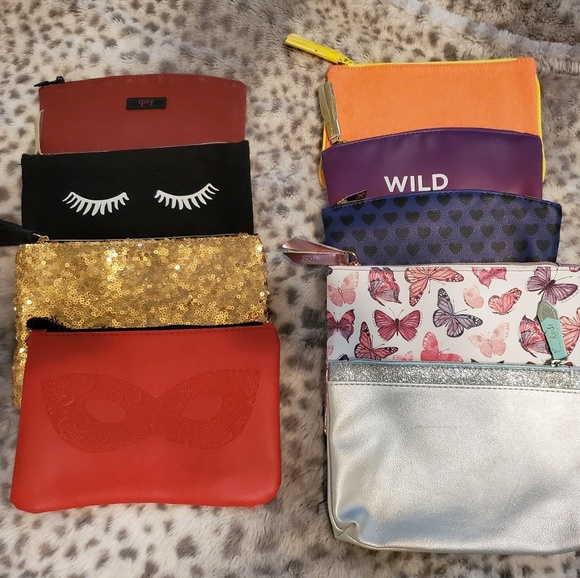 ipsy Handbags - Lot of 9 ipsy bags.